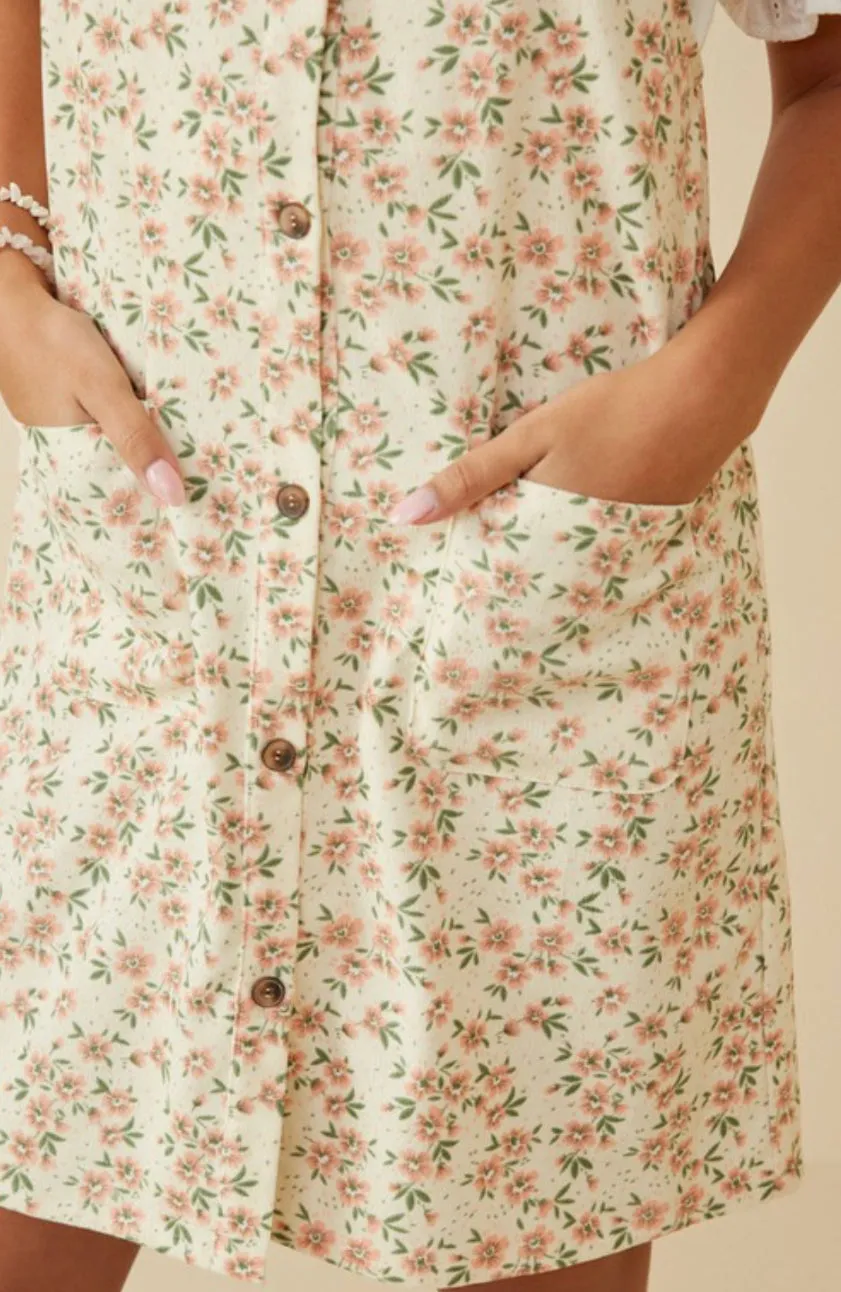 The Floral Overall Dress in Cream.